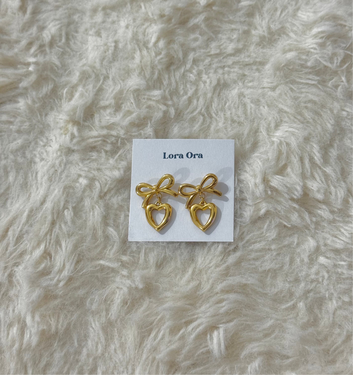 Bow heart earring